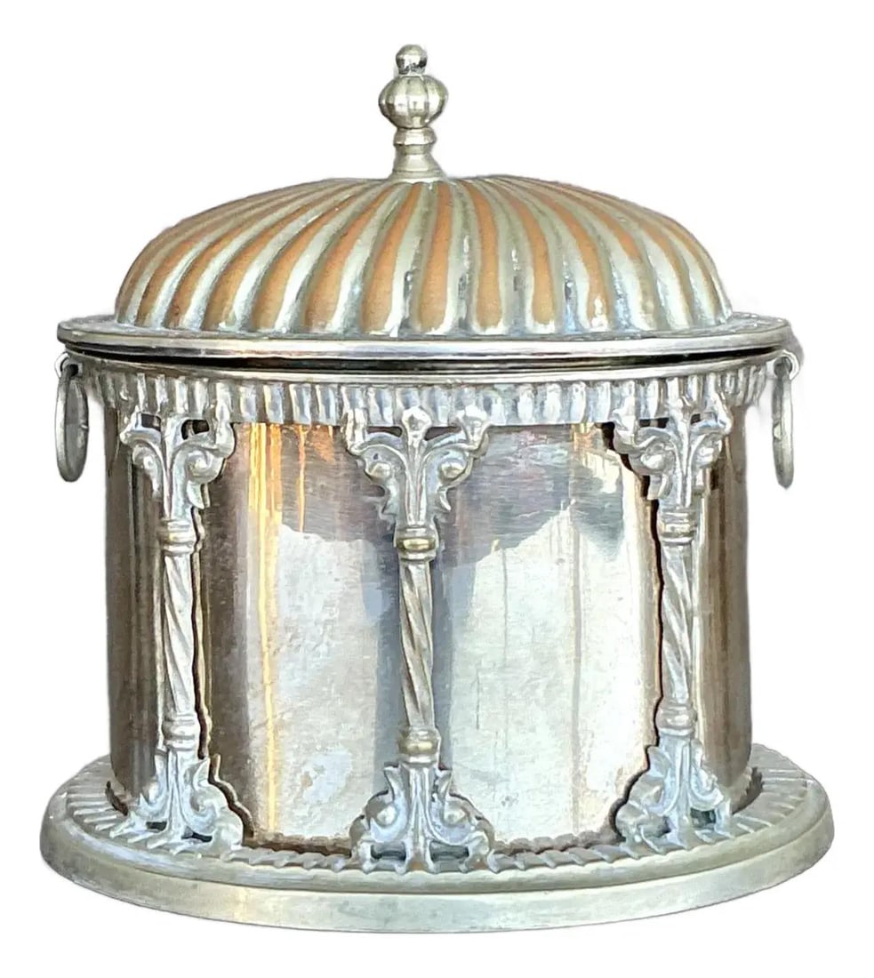 Vintage Regency Silverplate Biscuit Box with Neoclassical Design: Vintage Regency Silverplate Biscuit Box with Neoclassical Design Enhance your decor with this exquisite Vintage Plated Biscuit Box, inspired by Regency-era elegance. This beautifully crafted piece fea