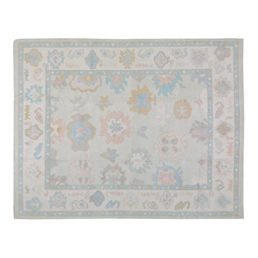 Hand-Knotted Wool Oushak Area Rug 8'x10'1" Tan Pakistan: Hand-Knotted Wool Oushak Area Rug 8'x10'1" Tan Pakistan This hand-knotted wool rug from Pakistan features traditional rug-making craftsmanship combined with a modern design sensibility. Its soft textu