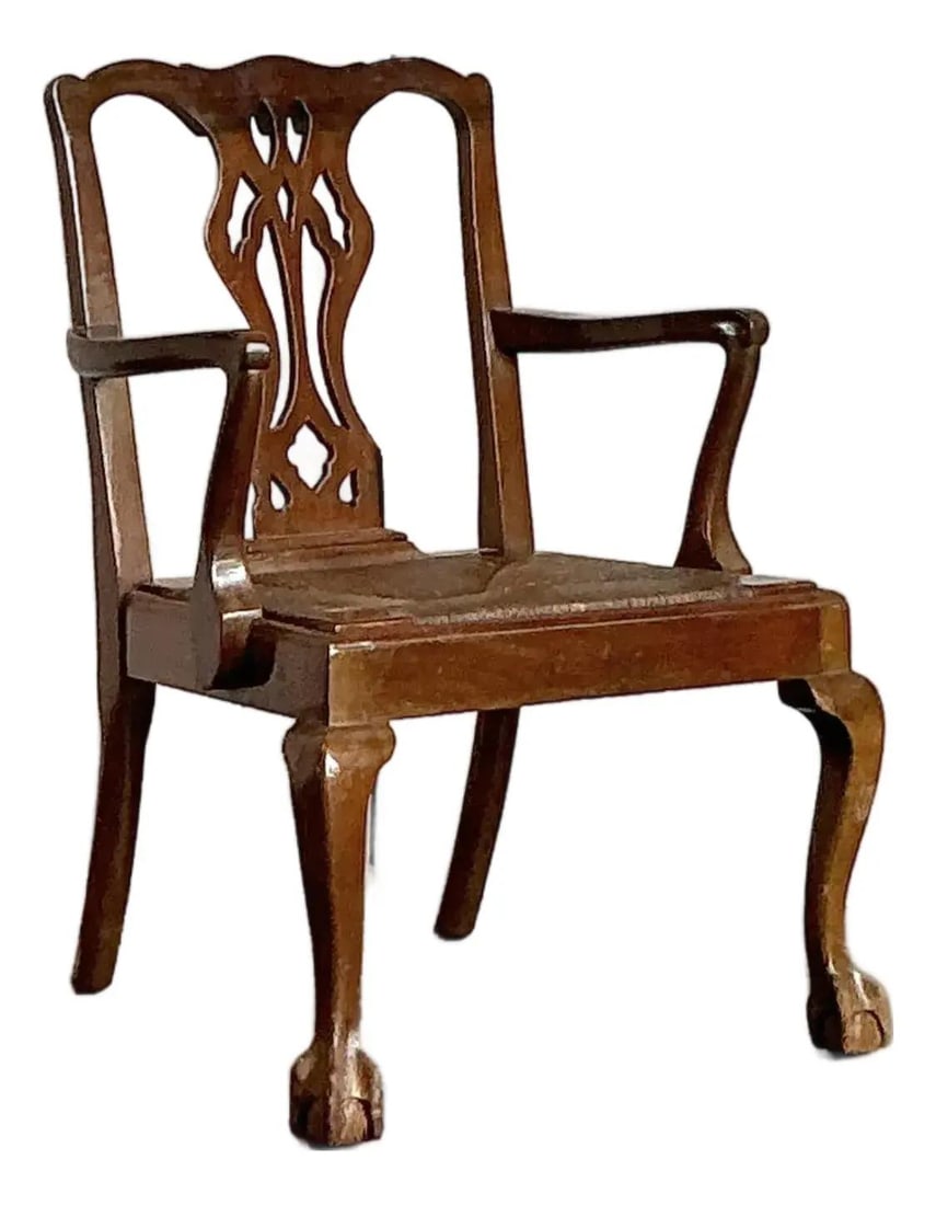 Regency Era Claw and Ball Chair by Paine Furniture Vintage Fireside Accent: Regency Era Claw and Ball Chair by Paine Furniture Vintage Fireside Accent This Vintage Regency Fireside Chair by Paine Furniture features a finely carved wooden frame, a detailed backrest, and classi