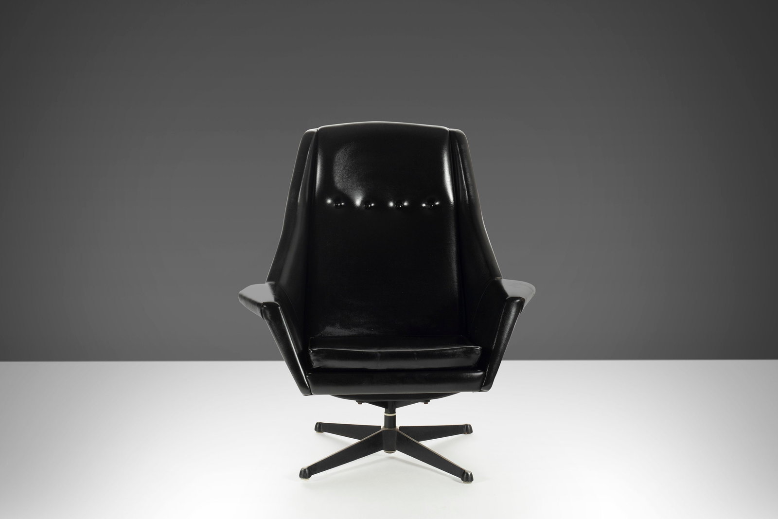Swedish Mid Century Modern High Back Swivel Lounge Chair Vinyl Steel Base: Swedish Mid Century Modern High Back Swivel Lounge Chair Vinyl Steel Base Discover the elegance of this Mid Century Modern High Back Swivel Lounge Chair from Sweden, featuring a stylish design on a sw