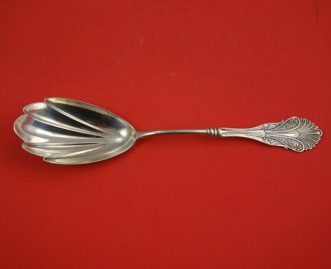 Shiebler Corinthian Serving Spoon by John Polhamus 8 5/8 inches: Shiebler Corinthian Serving Spoon by John Polhamus 8 5/8 inches This exquisite serving spoon, crafted by Shiebler, features the elegant Corinthian pattern designed by John Polhamus. Measuring 8 5/8 in