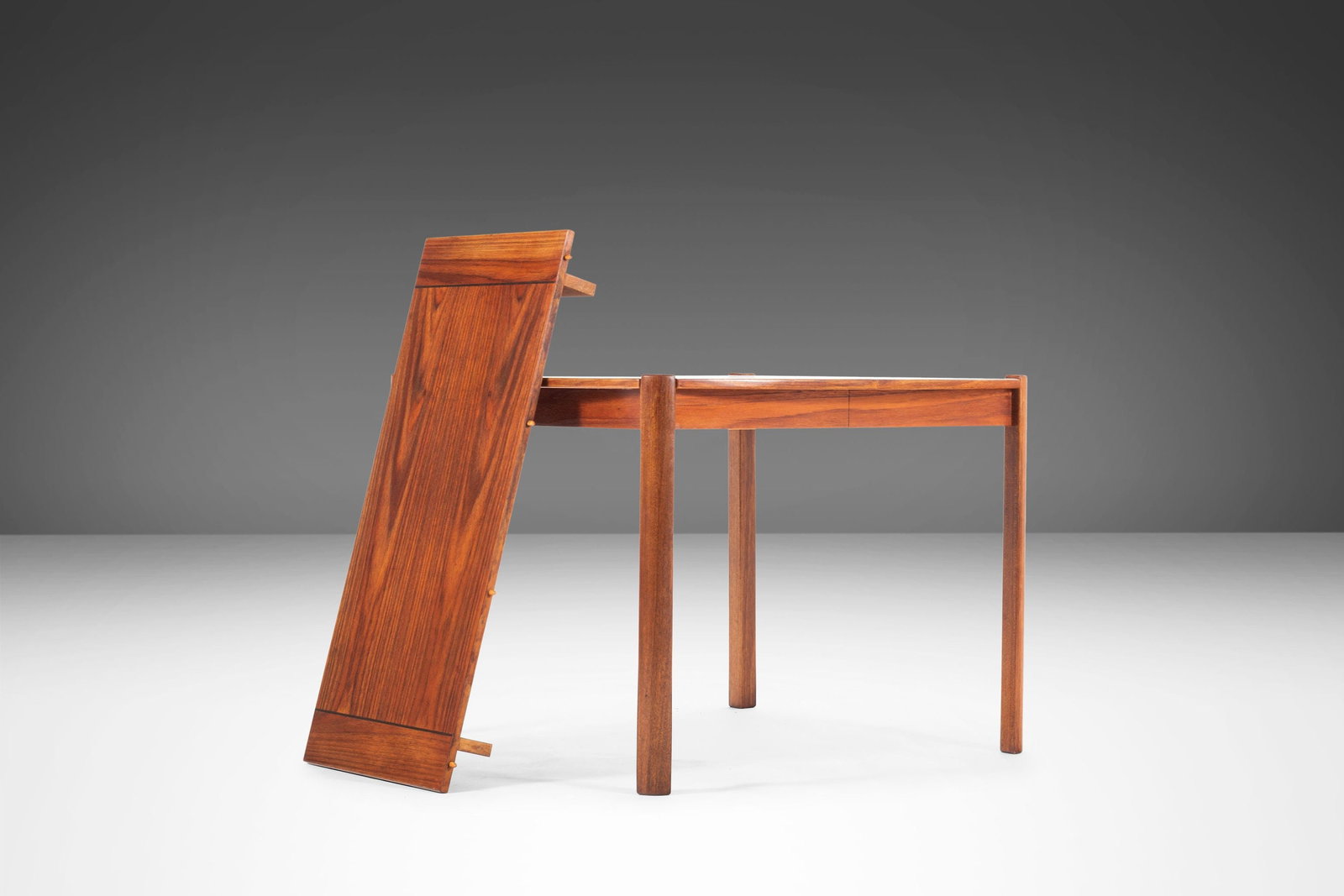 Danish Modern Teak Extension Dining Table c. 1960s Unique Design: Danish Modern Teak Extension Dining Table c. 1960s Unique Design Discover a unique Danish Modern extension dining table crafted from solid teak, a remarkable piece from Denmark, circa 1960s. This extr