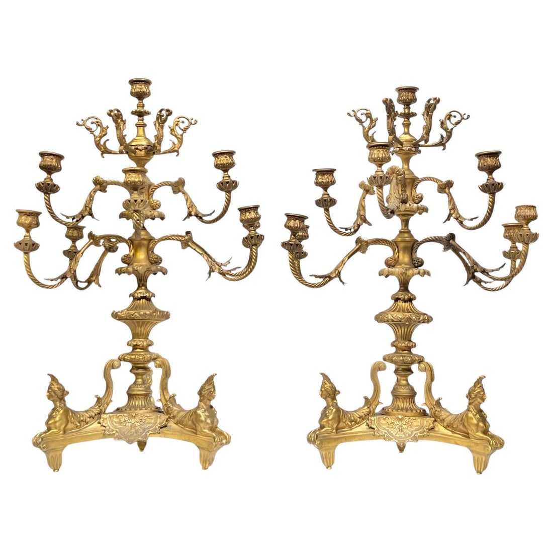 Pair of 19th Century Louis XIV Gilt Bronze 8-Light French Candelabra: Pair of 19th Century Louis XIV Gilt Bronze 8-Light French Candelabra This pair of 19th-century French gilt bronze candelabra is crafted in the Louis XIV style after the original 14th-century model by 