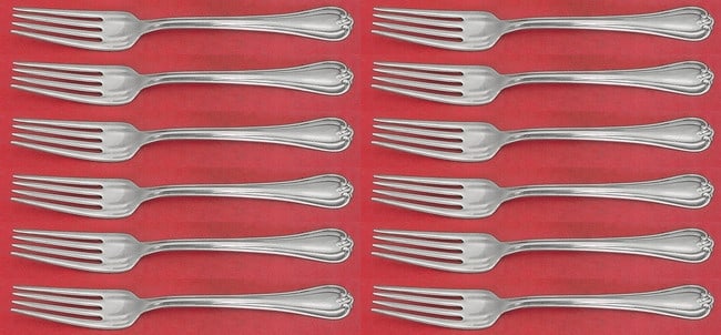 Reed & Barton Woodwind Sterling Silver Fork Set 12 pcs 7.5 Inches: Reed & Barton Woodwind Sterling Silver Fork Set 12 pcs 7.5 Inches This exquisite set of 12 regular forks features the elegant Woodwind pattern by Reed & Barton. Each fork measures 7 1/2" and is crafte