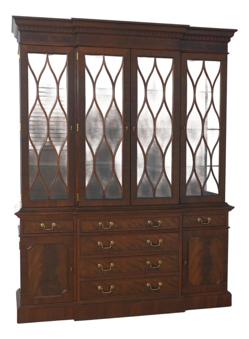 Mahogany Breakfront Display Cabinet Two Piece Traditional with Lighted Interior: Mahogany Breakfront Display Cabinet Two Piece Traditional with Lighted Interior This traditional breakfront china display cabinet is crafted from mahogany and features high-quality construction with d
