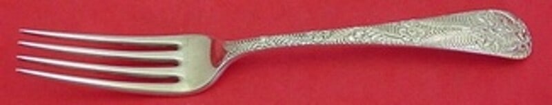 Tiffany & Co Antique Engraved Sterling Silver Dinner Fork 8 1/8": Tiffany & Co Antique Engraved Sterling Silver Dinner Fork 8 1/8" This exquisite dinner fork from Tiffany & Co. showcases the timeless elegance of their Antique Engraved pattern, also known as Custom E