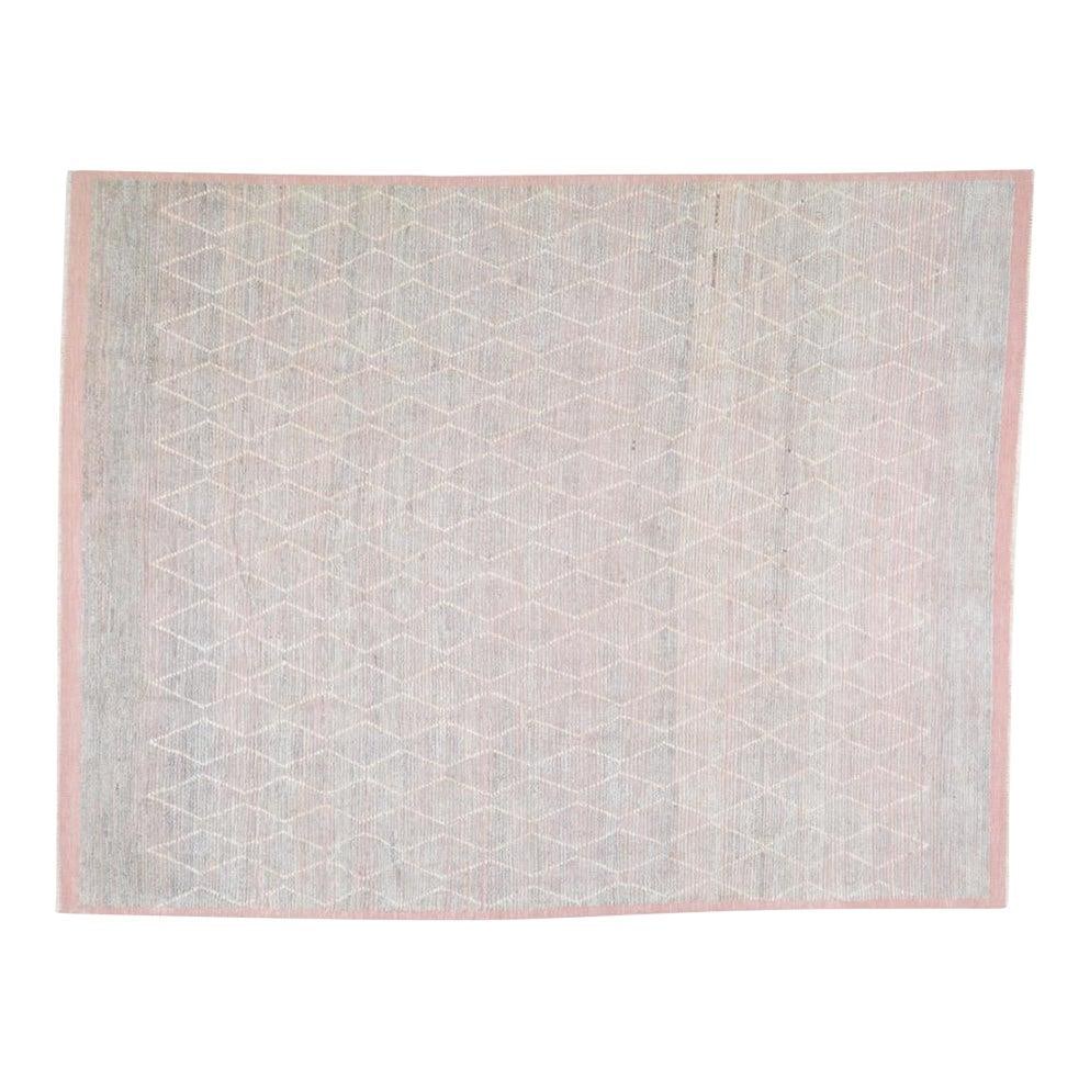 Salmon Wool Area Rug Hand Knotted Moroccan Style 8'2 x 10'5: Salmon Wool Area Rug Hand Knotted Moroccan Style 8'2 x 10'5 This hand-knotted wool rug showcases traditional Moroccan craftsmanship combined with a modern design aesthetic. Made from durable and soft 