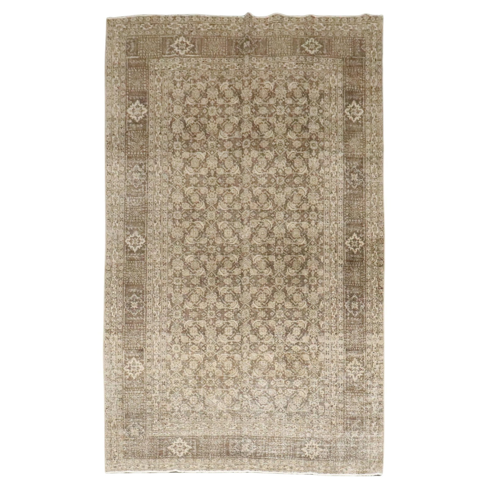 Antique Persian Tabriz Rug 6'6 x 10'9 Hand-Woven Wool: Antique Persian Tabriz Rug 6'6 x 10'9 Hand-Woven Wool This exquisite antique Persian Tabriz rug showcases a harmonious blend of brown and cream hues, embodying the elegance of early 20th-century craft