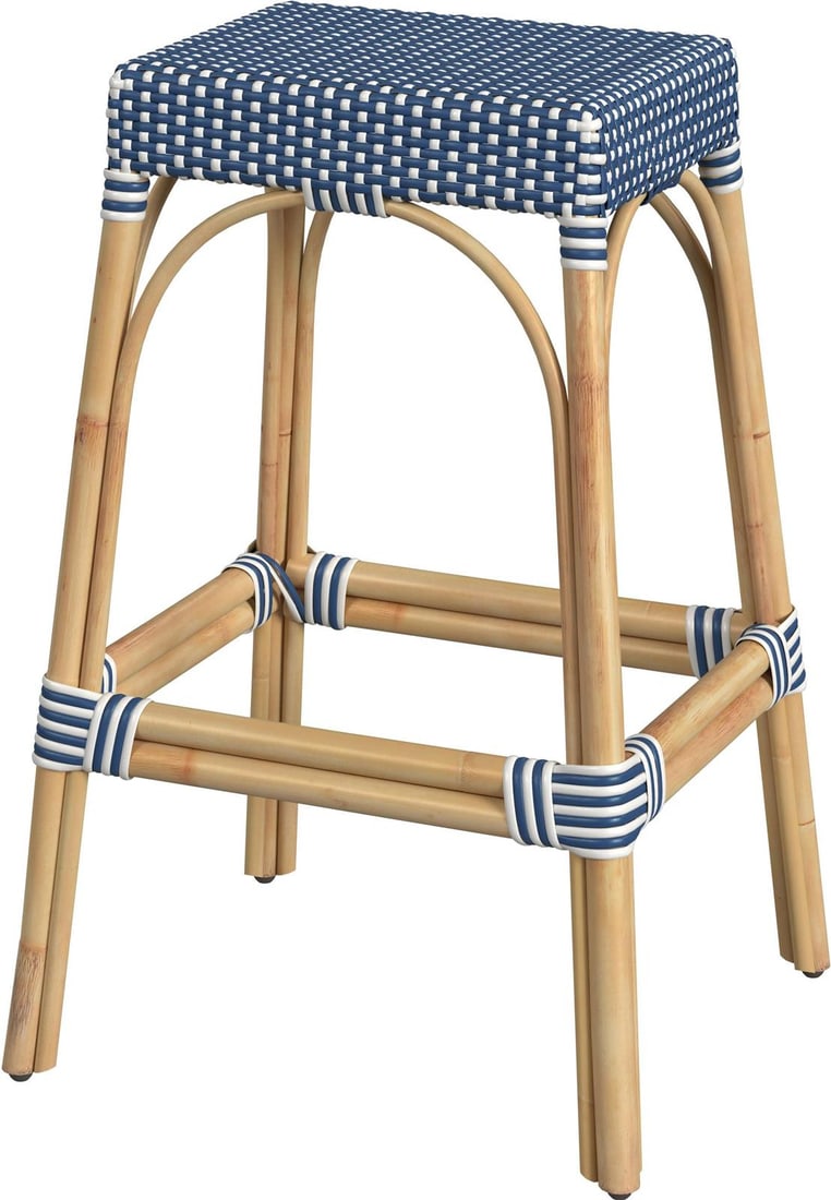 Butler Coastal Charm Tobias Barstool Natural Rattan Blue: Butler Coastal Charm Tobias Barstool Natural Rattan Blue Introducing the Tobias Barstool, a perfect blend of style and comfort with its Coastal charm. This barstool features a natural rattan frame com
