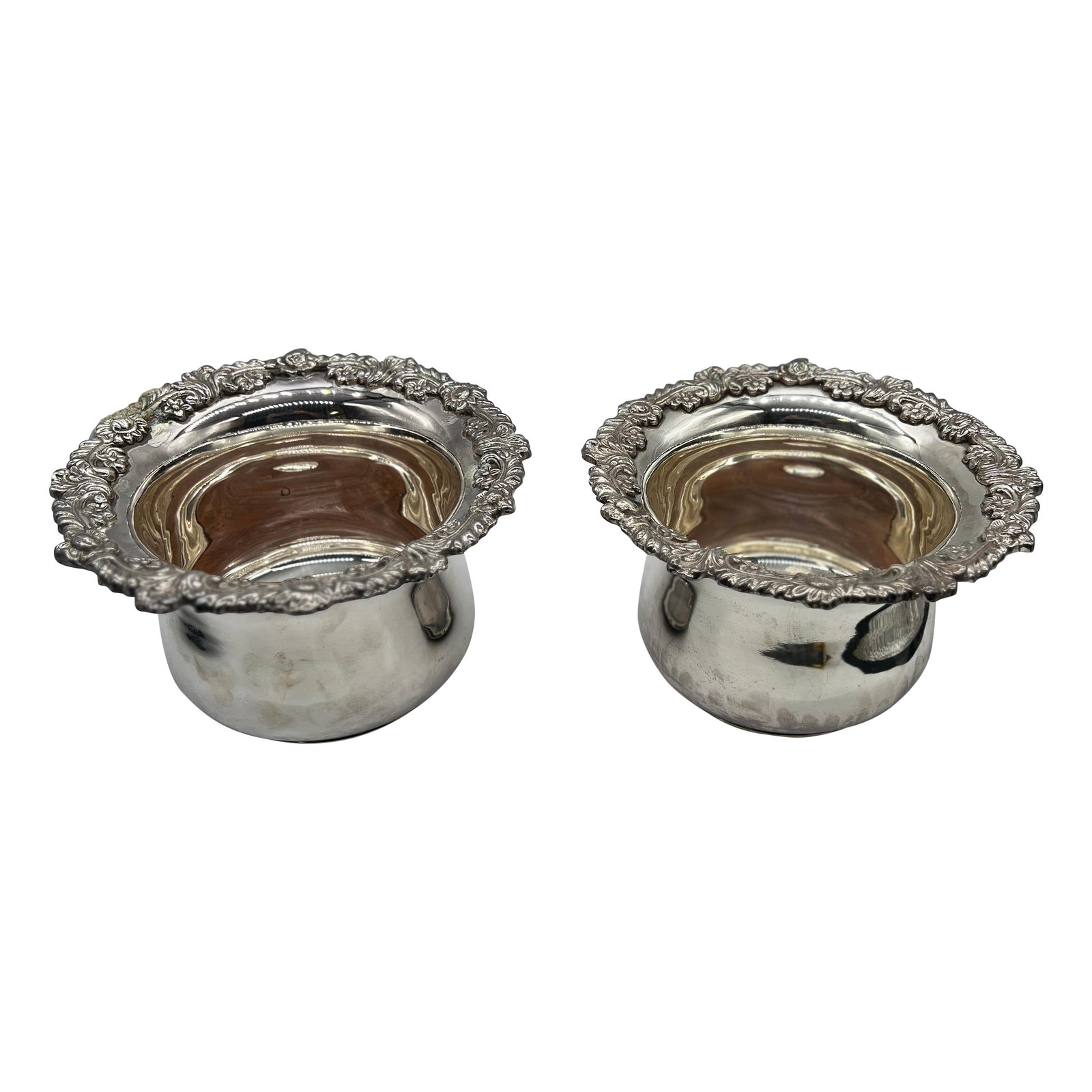 Set of 2 Large Silver Plated Royal Castle Bottle Holders England: Set of 2 Large Silver Plated Royal Castle Bottle Holders England This exquisite set of two large English Royal Castle bottle holders or coasters showcases elegant floral and rococo style banding along