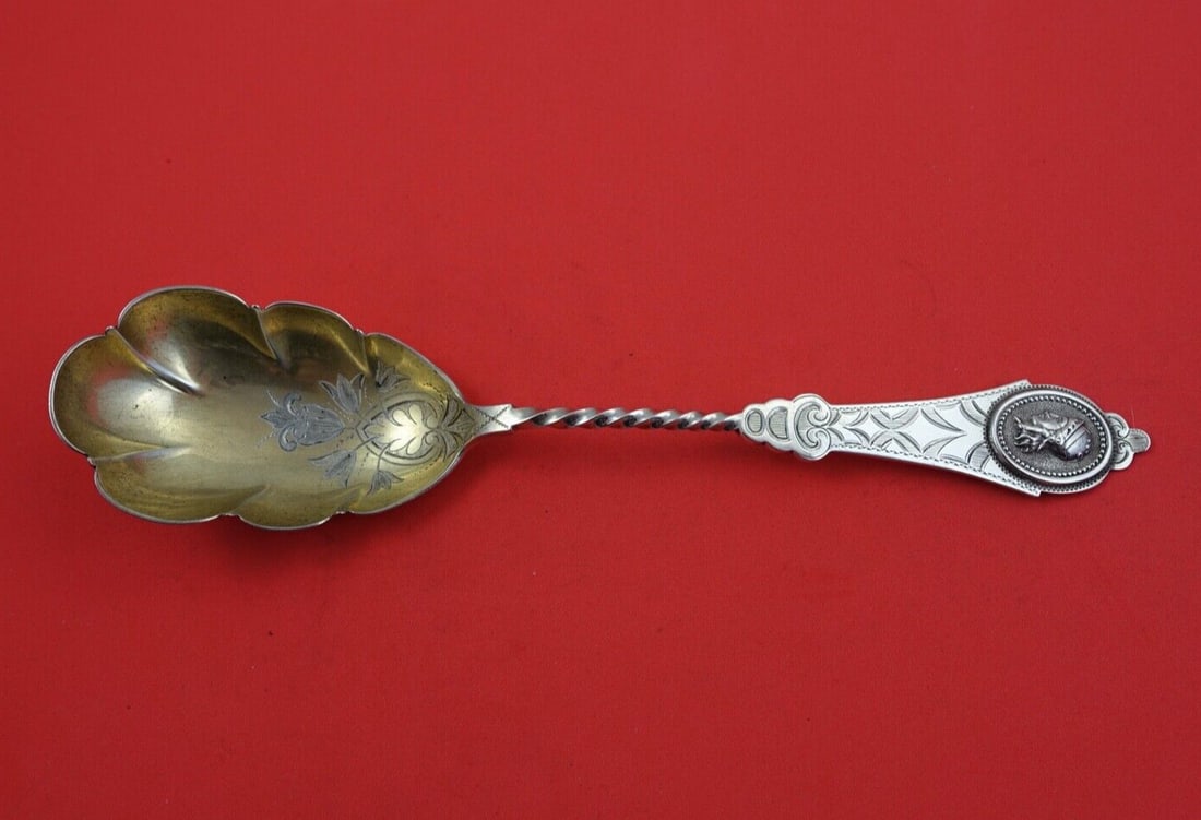 Newell Harding & Co Medallion 9 Inch Berry Spoon Gold Wash: Newell Harding & Co Medallion 9 Inch Berry Spoon Gold Wash Exquisite Medallion Berry Spoon by Newell Harding & Co. This stunning piece, crafted from bright-cut coin silver, features a gold wash finish