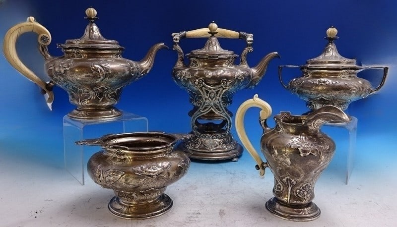 Five-Piece Sterling Silver Tea Service Athenic Pattern by Gorham: Five-Piece Sterling Silver Tea Service Athenic Pattern by Gorham This remarkable Athenic by Gorham five-piece tea set is crafted in sterling silver and features a multi-floral watercolor style. The se