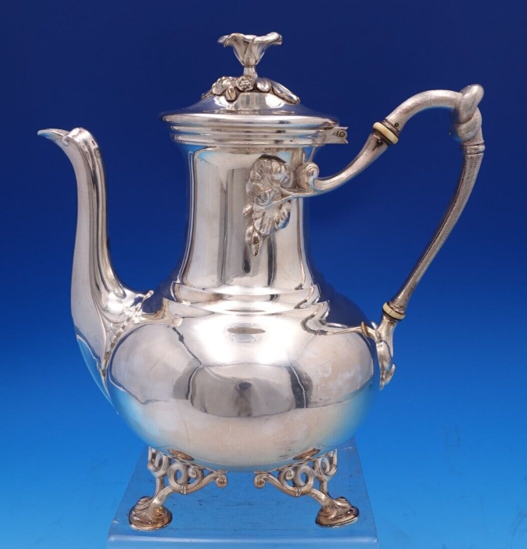 Christofle Marly Silverplate Coffee Pot with Flower Finial 9 inches: Christofle Marly Silverplate Coffee Pot with Flower Finial 9 inches This elegant Marly coffee pot by Christofle is a stunning addition to any collection. Crafted from silverplate, this piece features 