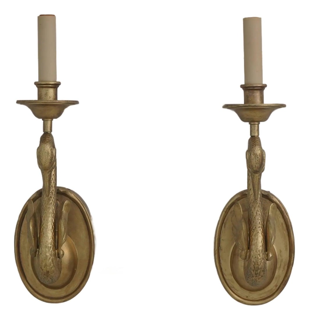 Pair of French Empire Solid Brass Swan Wall Sconces by Chapman Circa 1983: Pair of French Empire Solid Brass Swan Wall Sconces by Chapman Circa 1983 Pair of electrified wall sconces from the 1980s, crafted in solid brass with a French Empire style and swan-inspired scrolling