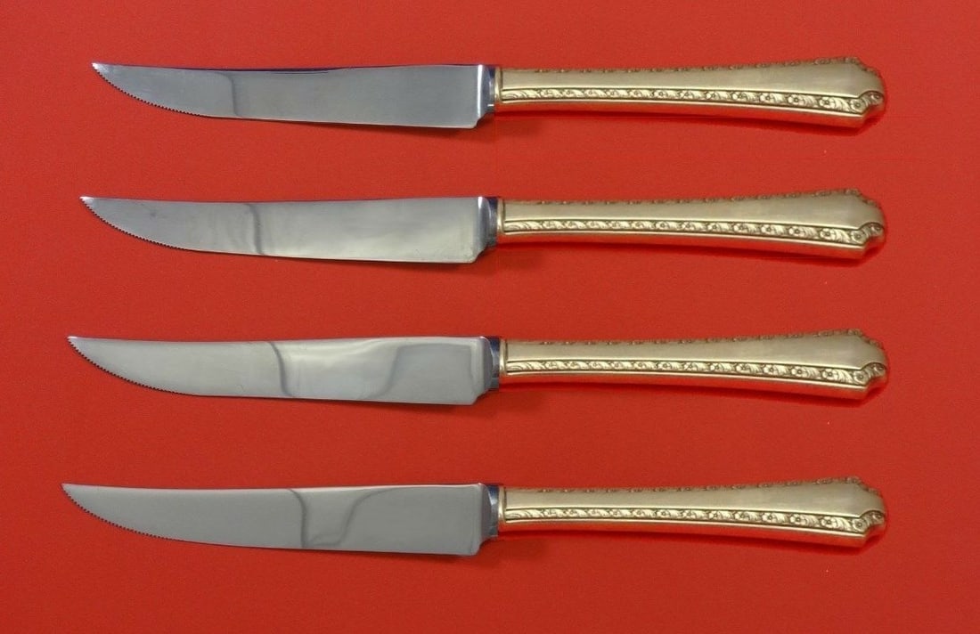 Wallace Larkspur Sterling Silver Steak Knife Set 4pc Custom 8.5": Wallace Larkspur Sterling Silver Steak Knife Set 4pc Custom 8.5" Elevate your dining experience with this exquisite 4-piece steak knife set from the renowned Larkspur pattern by Wallace. Crafted from 