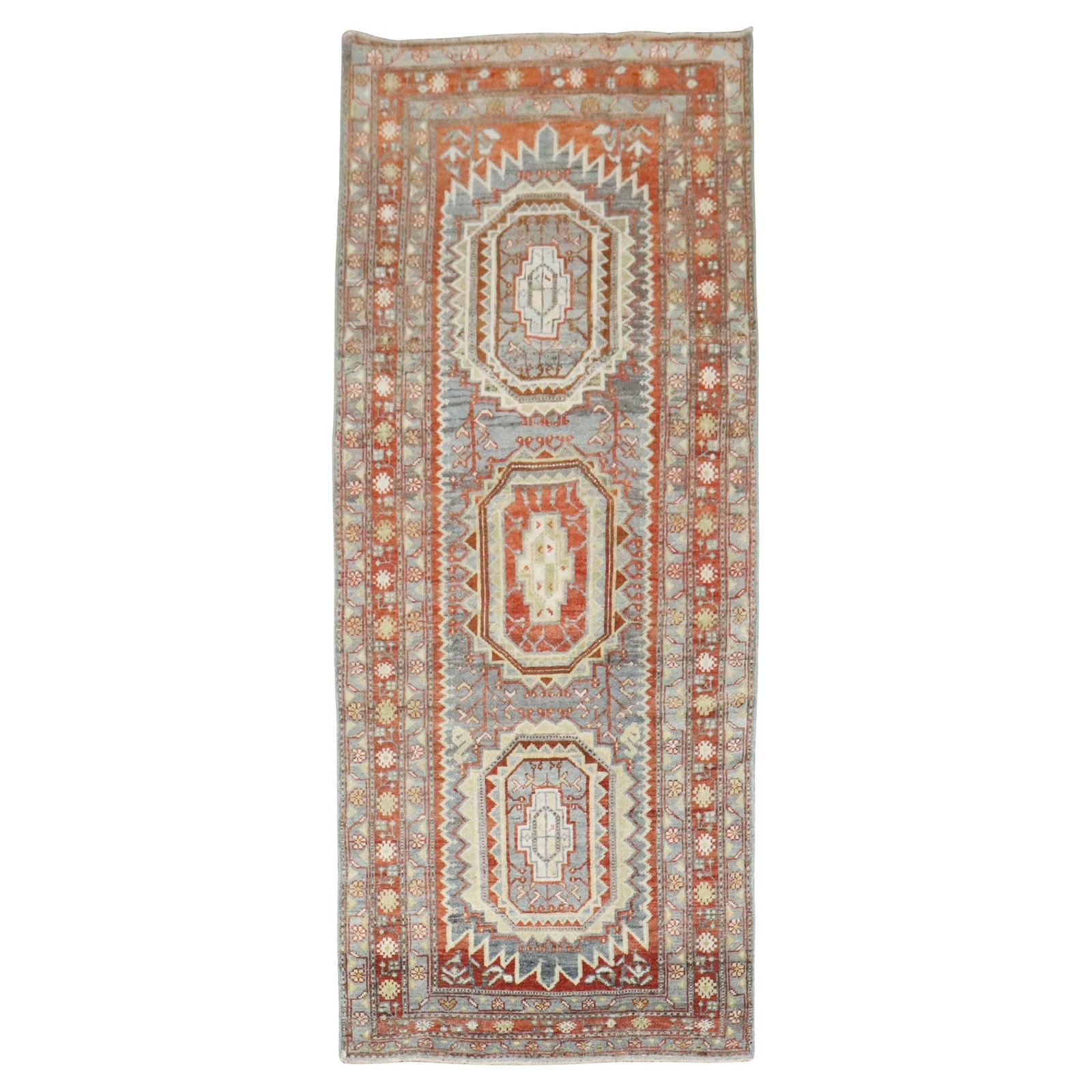 Early 20th Century Persian Senneh Wool Small Hand-Knotted Runner Rug: Early 20th Century Persian Senneh Wool Small Hand-Knotted Runner Rug This early 20th century Persian Senneh Malayer runner features a hand-knotted wool construction, showcasing the traditional craftsm