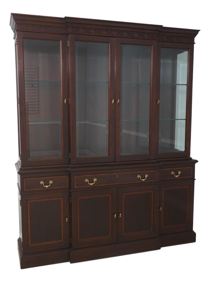 Mahogany Chippendale China Display Cabinet with Inlay and Beveled Glass: Mahogany Chippendale China Display Cabinet with Inlay and Beveled Glass This Stickley china cabinet features a Chippendale style with fine inlay work throughout. Crafted from mahogany, it showcases tr