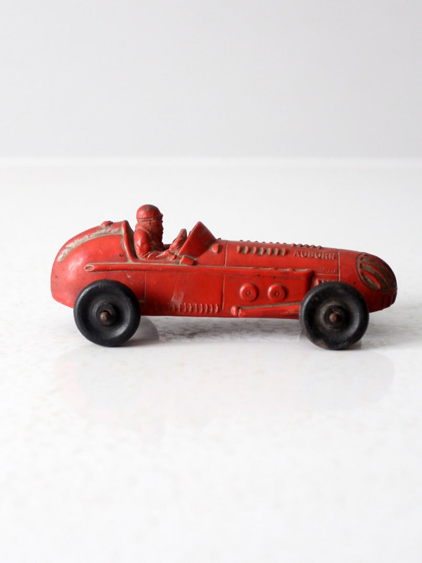 Vintage Auburn Rubber Co Indy Racer Toy Car Red Black Wheels: Vintage Auburn Rubber Co Indy Racer Toy Car Red Black Wheels Discover this charming vintage Auburn Rubber Co. toy car, a delightful representation of an Indy racer. Crafted in the USA, this collectibl