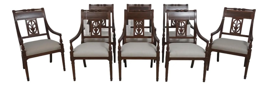 Set of 8 French Louis XVI Style Iven Dining Armchairs Upholstered Wood: Set of 8 French Louis XVI Style Iven Dining Armchairs Upholstered Wood This set includes eight Theodore Alexander 'The Iven' dining room armchairs crafted in the French Louis XVI style. Each chair fea