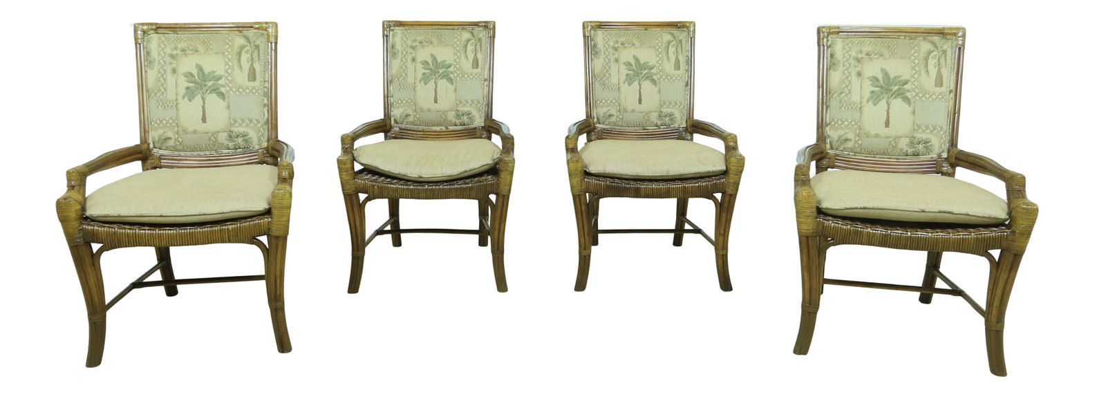 Set of 4 Brown Rattan Palm Upholstered Dining Chairs: Set of 4 Brown Rattan Palm Upholstered Dining Chairs This set of four Excursions Rattan Palm Upholstered Dining Chairs features quality construction with a stylish leather-wrapped rattan design. Appro