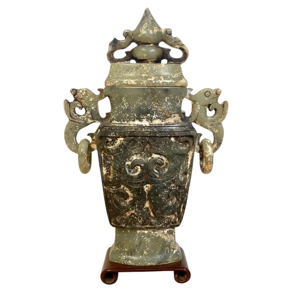 20th Century Chinese Carved Green White Quartz Vase with Cover: 20th Century Chinese Carved Green White Quartz Vase with Cover This exquisite Chinese carved green and white quartz vase with cover showcases the artistry of 20th-century Chinese craftsmanship. Standi