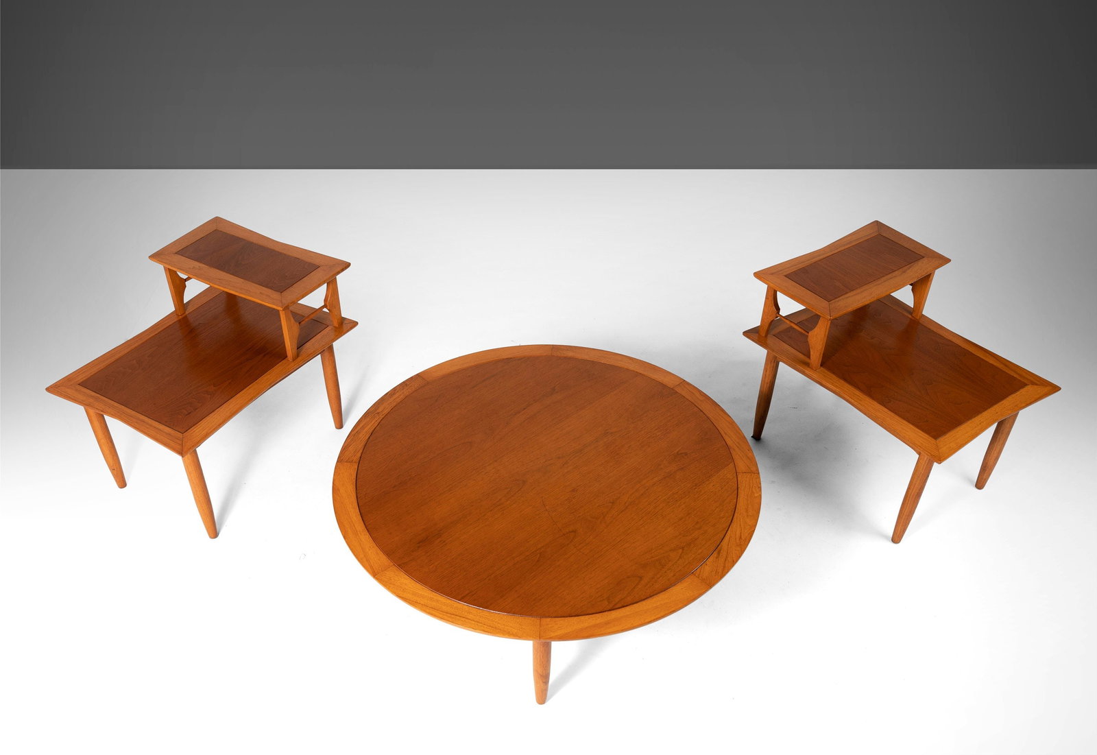Mid-Century Modern Pecan Coffee Table and 2-Tier End Tables by Lubberts & Mulder: Mid-Century Modern Pecan Coffee Table and 2-Tier End Tables by Lubberts & Mulder This exquisite set features a round coffee table and a pair of 2-tier end tables, attributed to Lubberts & Mulder for T