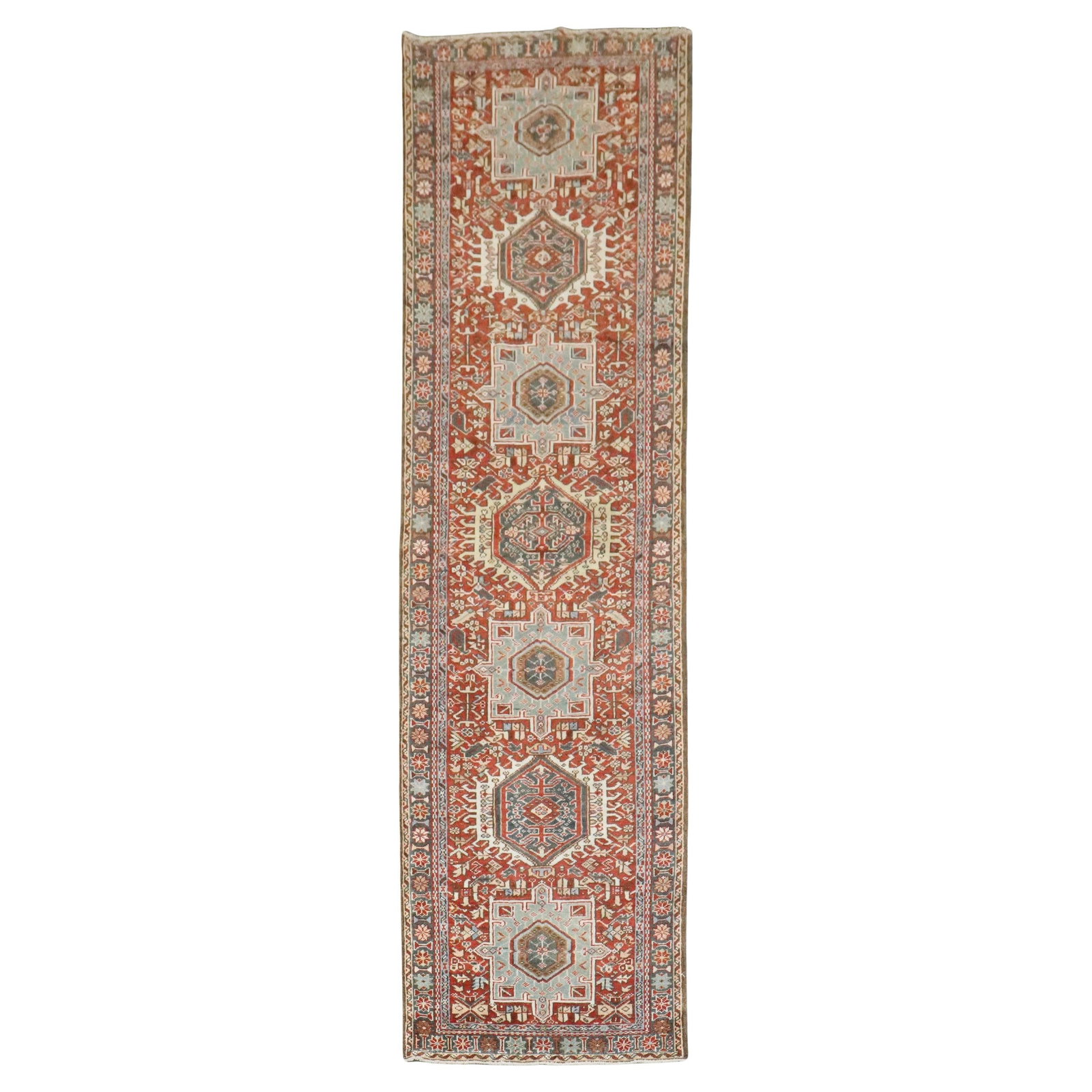 Narrow Persian Heriz Wool Runner Rug Early 20th Century 28 x 98 Inches: Narrow Persian Heriz Wool Runner Rug Early 20th Century 28 x 98 Inches This narrow Persian Heriz runner features a rustic style and is hand-woven from wool. Originating from Iran and dating to the ear