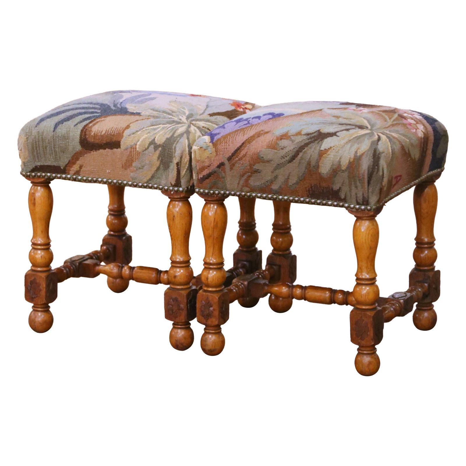 Set of 2 Louis XIII French Walnut Stools with Aubusson Upholstery: Set of 2 Louis XIII French Walnut Stools with Aubusson Upholstery This pair of late 19th century French Louis XIII stools is crafted from solid walnut with hand-carved details and patinated surfaces. 
