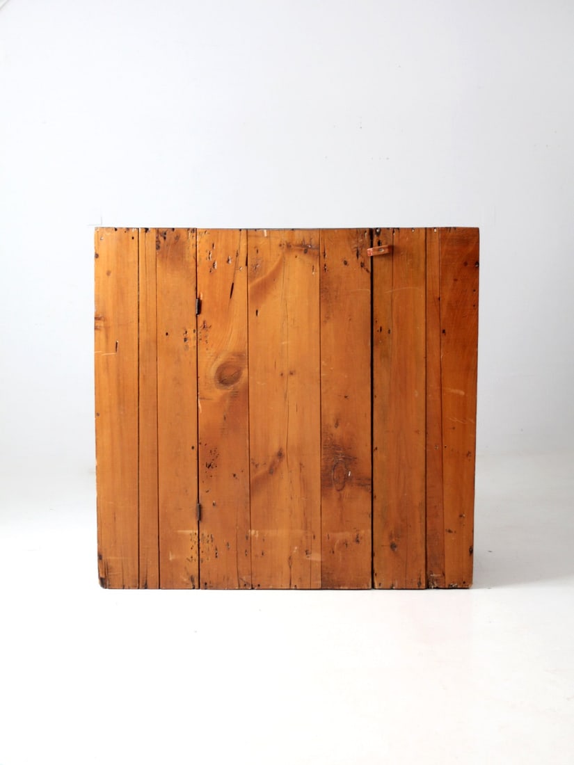 Rustic Antique Primitive Cupboard with Wood Slat Door and 3 Shelves: Rustic Antique Primitive Cupboard with Wood Slat Door and 3 Shelves This antique primitive cupboard showcases a charming rustic design, featuring a wood slat front door that opens to reveal three spac