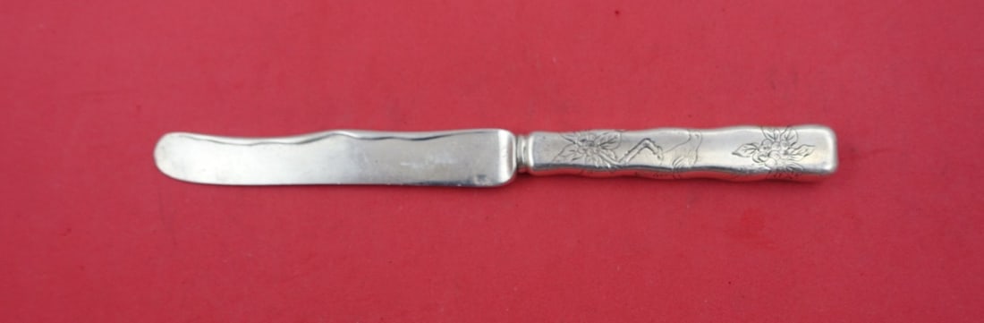 Tiffany & Co. Lap Over Edge Hand Engraved Sterling Silver Dessert Knife 7.5": Tiffany & Co. Lap Over Edge Hand Engraved Sterling Silver Dessert Knife 7.5" This exquisite dessert knife showcases the renowned craftsmanship of Tiffany & Co. Crafted from sterling silver, it feature