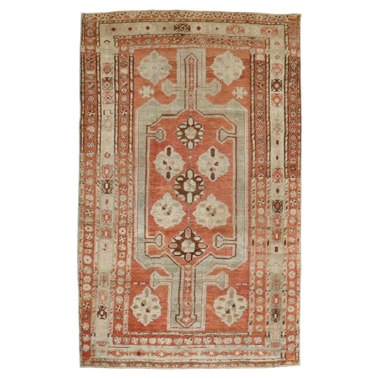 Early 20th Century Persian Kurd Wool Rug Hand-Knotted Geometric Design: Early 20th Century Persian Kurd Wool Rug Hand-Knotted Geometric Design This antique Persian Kurd accent rug from the early 20th century features a geometric design in muted reds and browns. Hand-knott