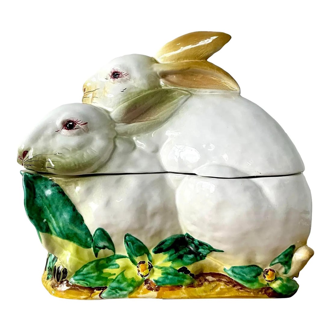 Italian Majolica Ceramic Tureen with Rabbit Lid Botanical Motif: Italian Majolica Ceramic Tureen with Rabbit Lid Botanical Motif This vintage Italian Regency-style lidded casserole is crafted from ceramic and features a whimsical design of two rabbits nestled toget