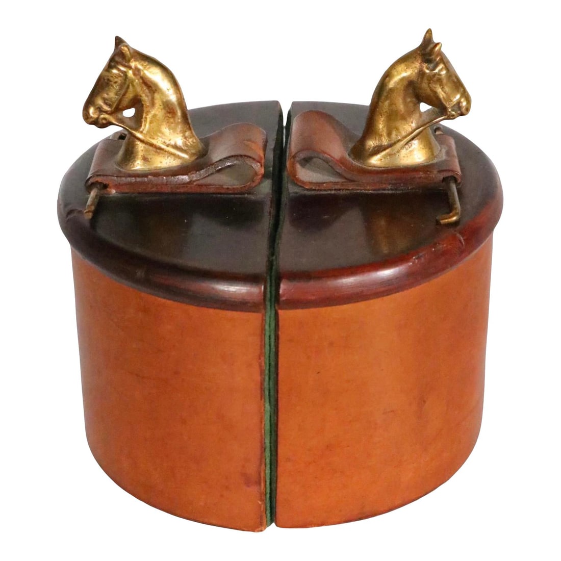 Vintage Leather Art Deco Horse Head Bookends 1930s USA: Vintage Leather Art Deco Horse Head Bookends 1930s USA This chic pair of leather-wrapped Art Deco bookends from the 1930s features elegantly cast metal horse heads topped with a metal riding crop. The