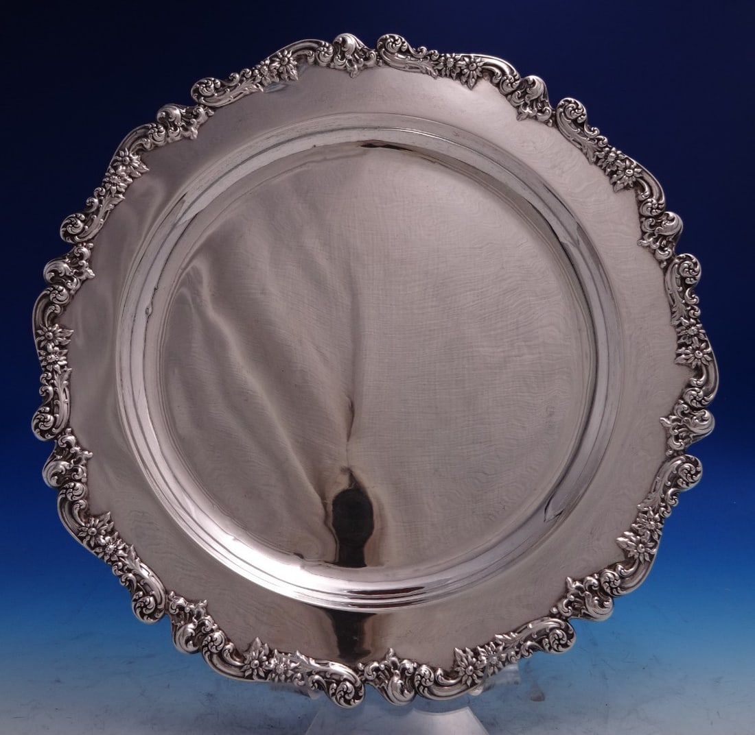 Sterling Silver 14 Inch Beverage Tray by Bigelow and Kennard 23.5 Troy Ounces: Sterling Silver 14 Inch Beverage Tray by Bigelow and Kennard 23.5 Troy Ounces This sterling silver beverage tray by Bigelow & Kennard features an elegant scrolling and floral rim. Measuring 14 inches 