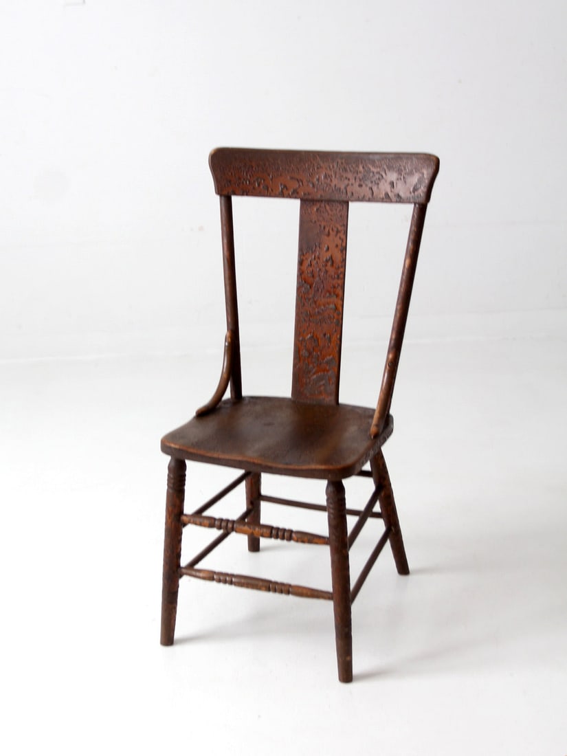 19th Century Antique Splat-Back Side Chair with Alligatored Finish: 19th Century Antique Splat-Back Side Chair with Alligatored Finish This elegant 19th-century antique splat-back side chair showcases a gracefully tapered silhouette and a shaped seat. Its alligatored 