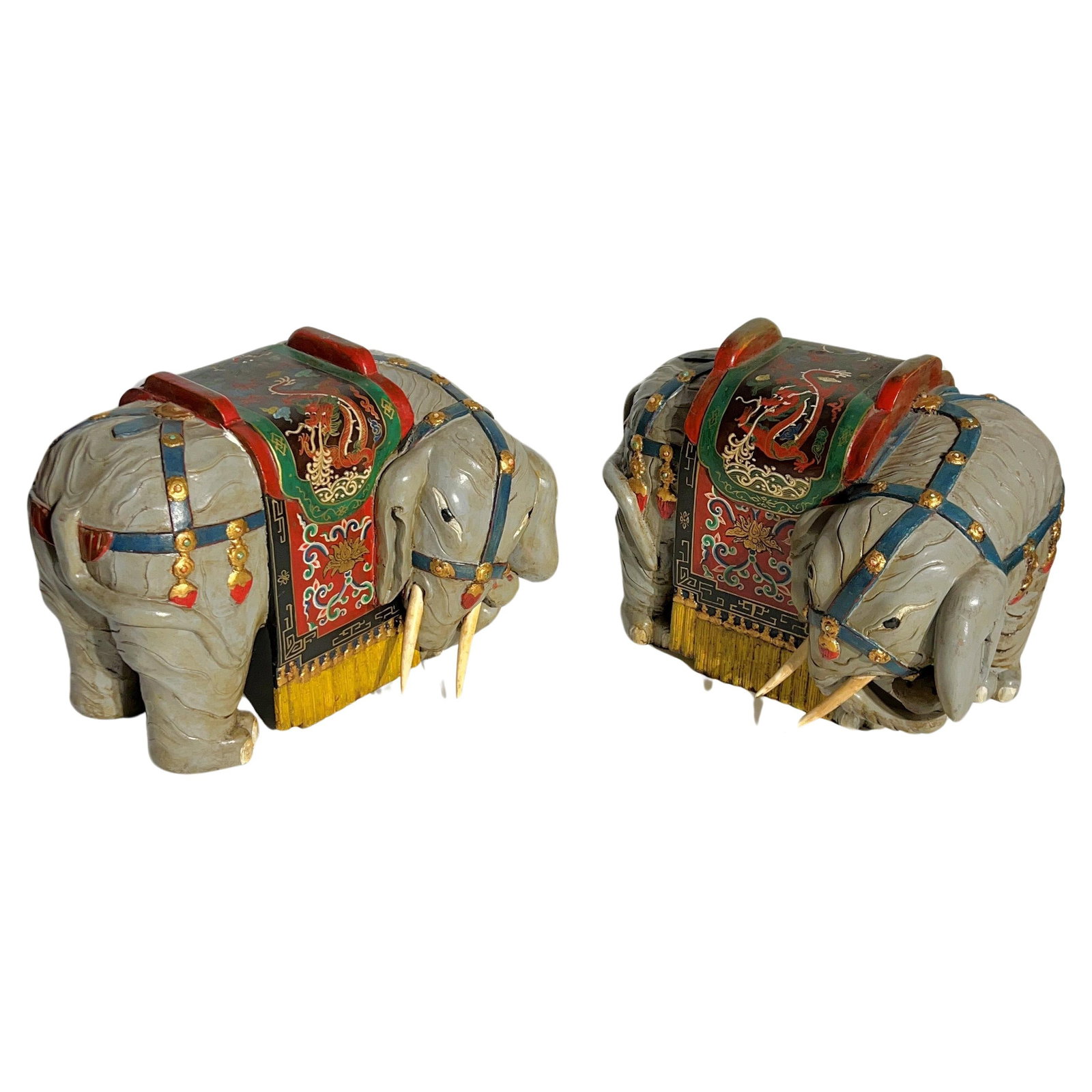 Set of 2 Hand-Painted Asian Wooden Elephant Sculptures Mid 20th Century: Set of 2 Hand-Painted Asian Wooden Elephant Sculptures Mid 20th Century This pair of vintage wooden Chinese ceremonial processional elephant figures features hand-painted polychrome designs, reflectin