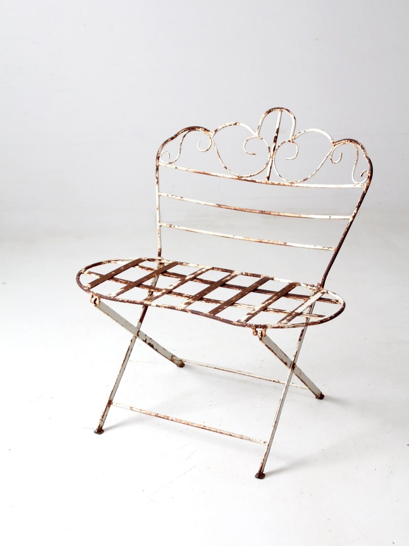 Art Nouveau Antique Metal Folding Garden Bench: Art Nouveau Antique Metal Folding Garden Bench Enhance your outdoor space with this charming antique metal garden bench, showcasing a captivating art nouveau style. The bench features a beautifully cu