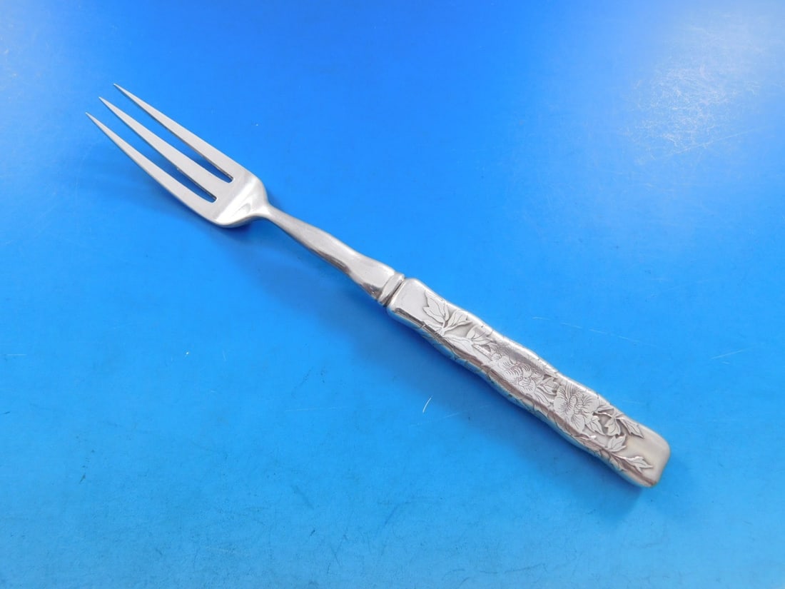Tiffany Sterling Silver Lap Over Acid Etched Fruit Fork 7": Tiffany Sterling Silver Lap Over Acid Etched Fruit Fork 7" This exquisite 7-inch fruit fork features the stunning Lap Over Edge pattern, beautifully acid etched by Tiffany & Co. Crafted from high-qual