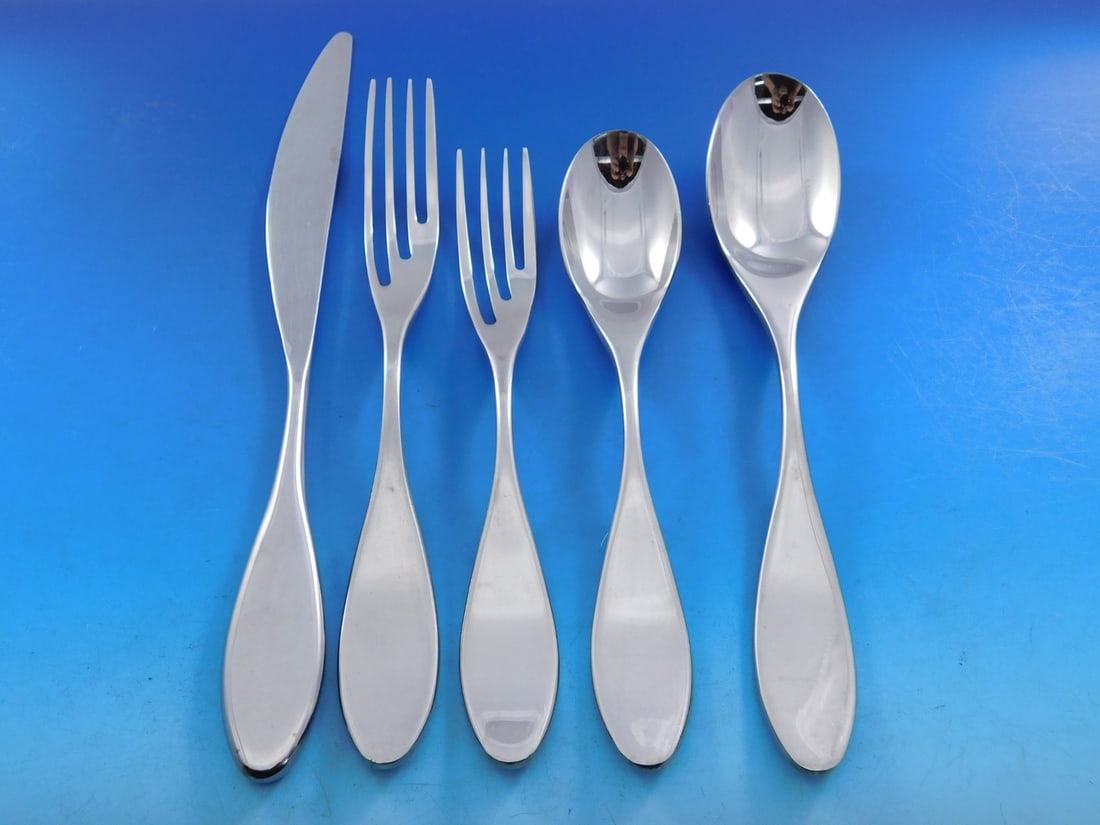 61-piece Paddle flatware set modern stainless steel service by Nambe: 61-piece Paddle flatware set modern stainless steel service by Nambe This Nambe Paddle flatware set features a modern Mid-Century design crafted from stainless steel. The 61-piece collection includes 