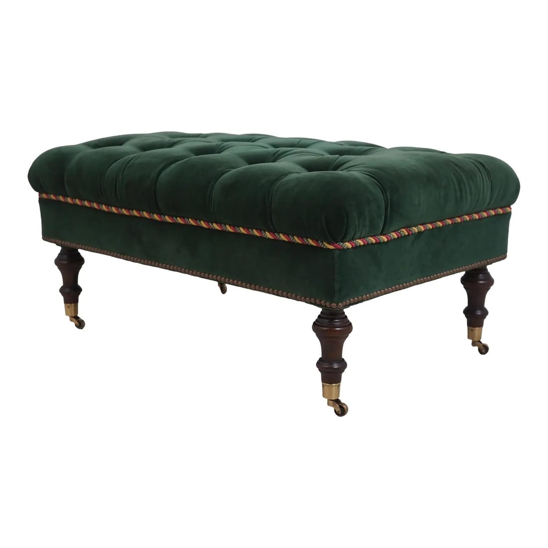 Edward Ferrell Green Velvet Ottoman with Cherry Legs and Brass Casters: Edward Ferrell Green Velvet Ottoman with Cherry Legs and Brass Casters This elegant Edward Ferrell tufted ottoman features a striking green velvet upholstery complemented by a decorative rope trim. Cr
