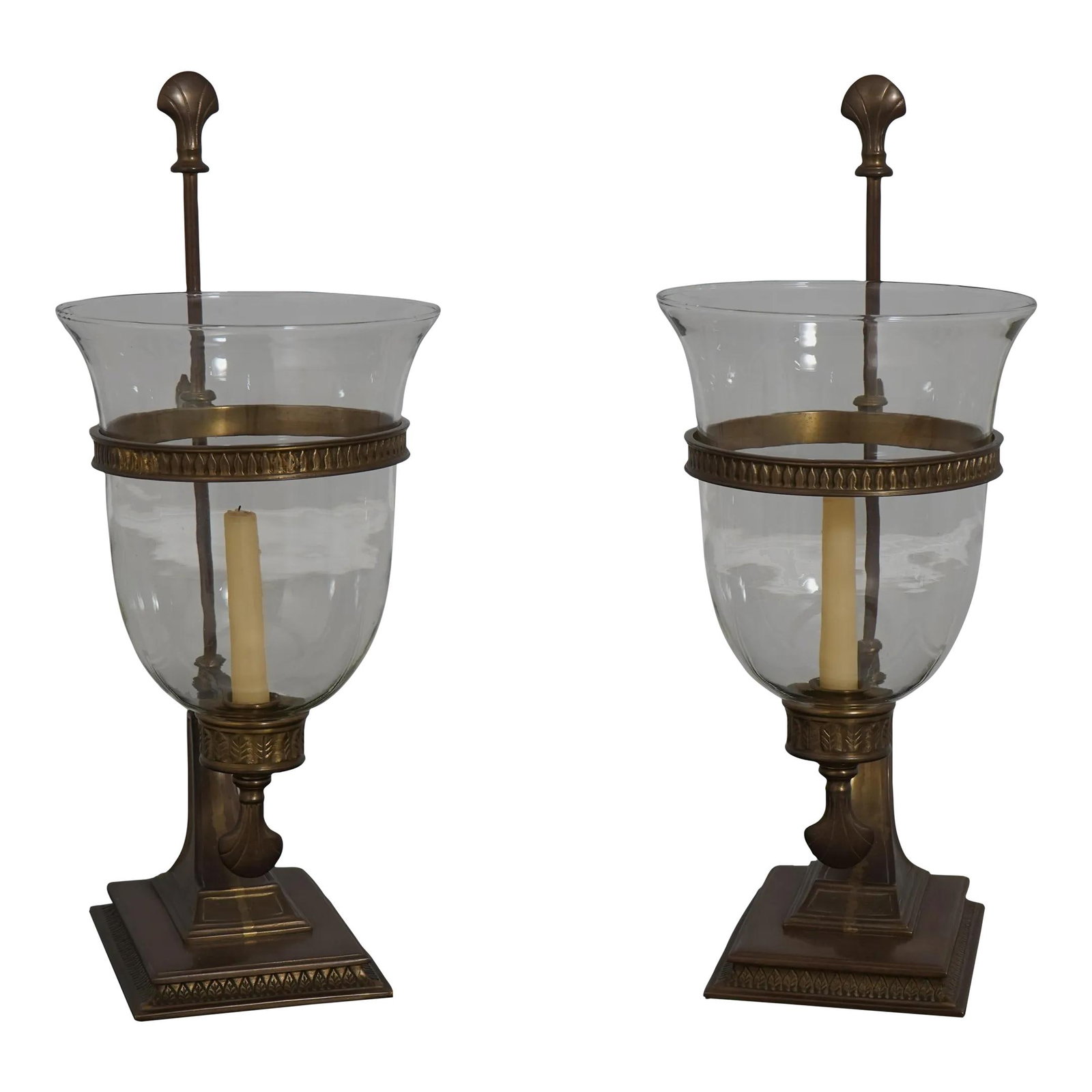Regency Style Brass Candelabras with Glass Globes Attributed to Chapman: Regency Style Brass Candelabras with Glass Globes Attributed to Chapman This exquisite pair of candelabras, attributed to Chapman, showcases a beautiful Regency style that adds elegance to any setting