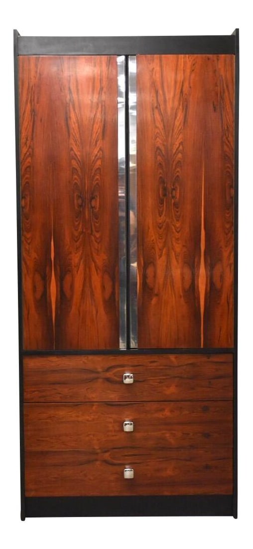 1970s Mid-Century Modern Rosewood Armoire Dresser Chrome Accents: 1970s Mid-Century Modern Rosewood Armoire Dresser Chrome Accents This mid-century modern armoire dresser features a stunning rosewood and black lacquer finish complemented by elegant chrome accents, r