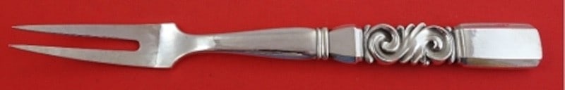 Sterling Silver 2-Tine Cold Meat Fork Scroll Pattern 9.5 Inch: Sterling Silver 2-Tine Cold Meat Fork Scroll Pattern 9.5 Inch This is a sterling silver cold meat fork in the Scroll pattern by Georg Jensen. Featuring a hollow handle and two tines, this 9 1/2 inch s