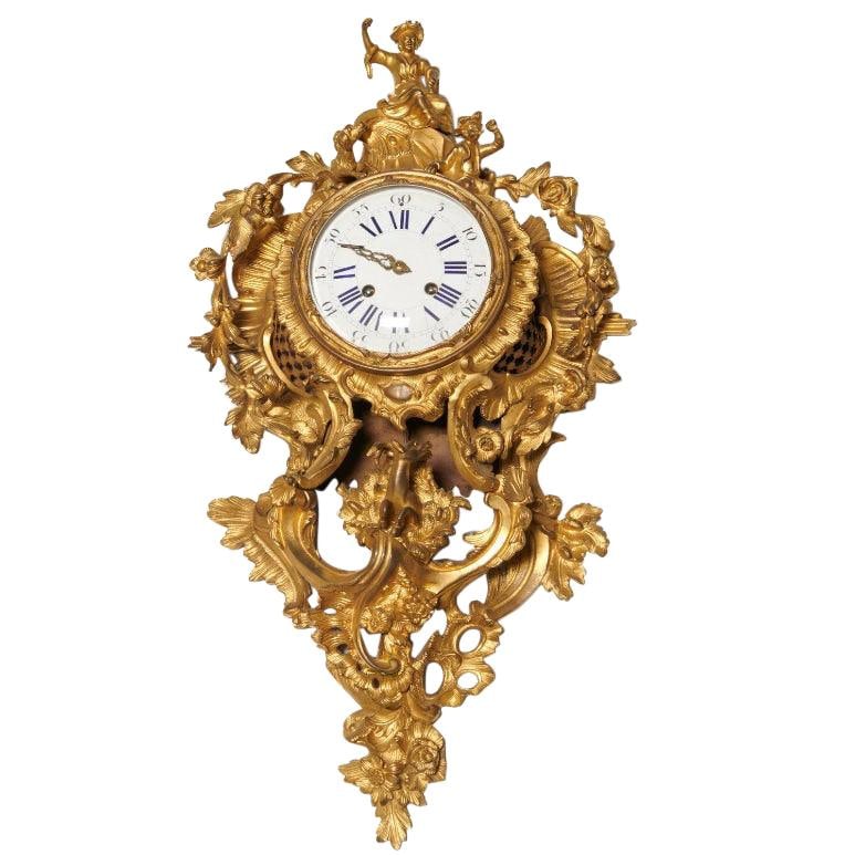 Chinoiserie Motif Gilt Bronze Cartel Clock Signed Raingo Freres France: Chinoiserie Motif Gilt Bronze Cartel Clock Signed Raingo Freres France This late 19th century French cartel clock features a Louis XV style with a Chinoiserie motif. Crafted from gilt bronze, the cloc