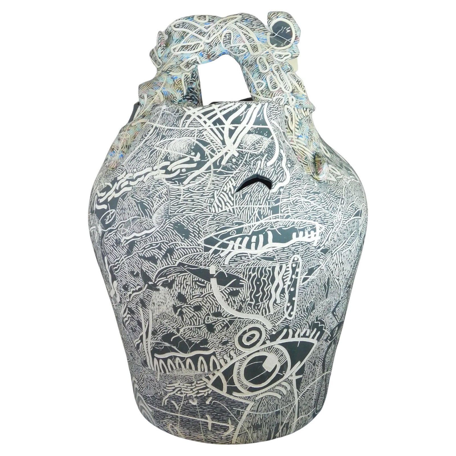 Monumental Sgraffito Ceramic Floor Vase with Mid-Century Modern Carved Motifs: Monumental Sgraffito Ceramic Floor Vase with Mid-Century Modern Carved Motifs This impressive Mid-Century Modern floor vase features hand-carved sgraffito designs with abstract and still life motifs. 