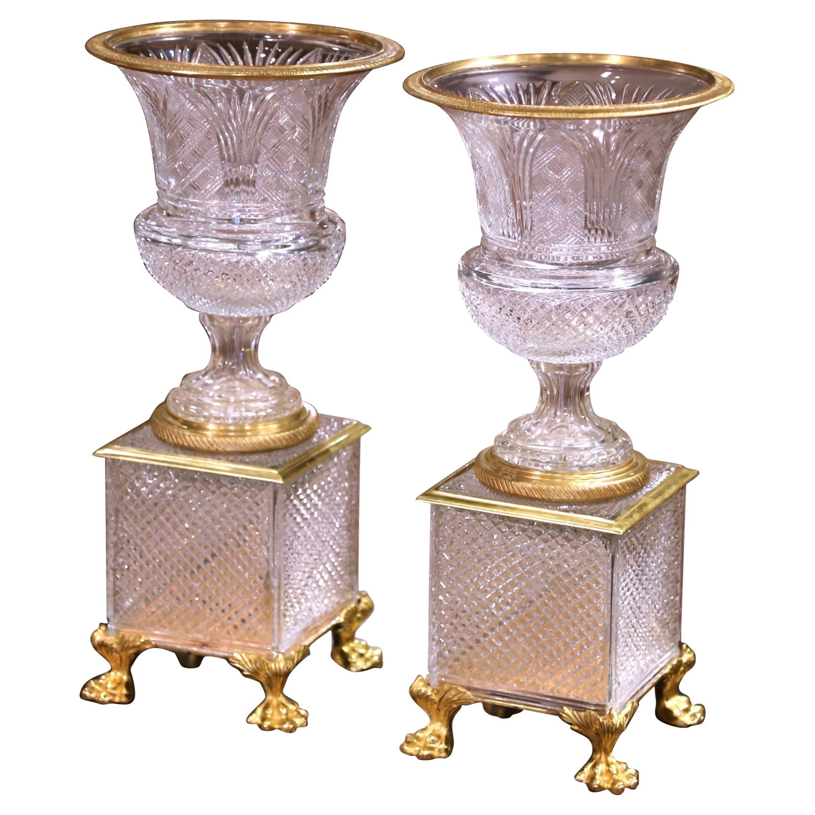 19th Century French Neoclassical Cut Crystal Gilt Bronze Urn Set of 2: 19th Century French Neoclassical Cut Crystal Gilt Bronze Urn Set of 2 This exquisite pair of 19th-century French urns combines the elegance of cut crystal with the opulence of gilt bronze. Crafted cir