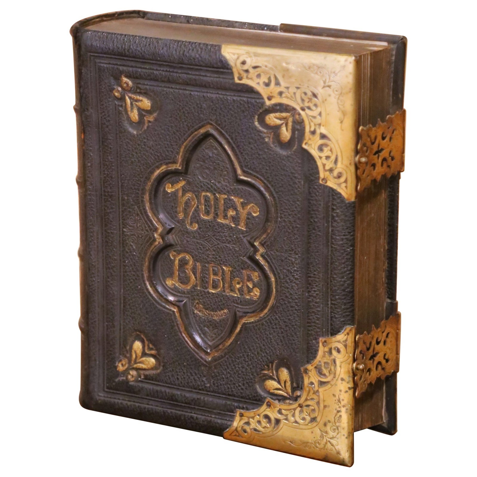 Victorian Era English Leather Family Bible with Ornate Brass Hardware: Victorian Era English Leather Family Bible with Ornate Brass Hardware This late 19th-century English Holy Bible is bound in richly embossed black leather with ornate gilt decoration and features subst