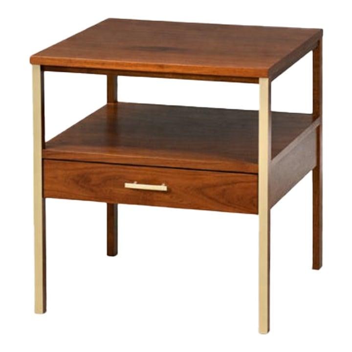 Walnut Nightstand Calvin Collection by Paul McCobb Mid Century Modern Refinished: Walnut Nightstand Calvin Collection by Paul McCobb Mid Century Modern Refinished This mid-century modern nightstand was designed by Paul McCobb for the Calvin Collection and dates to the 1960s. It fea