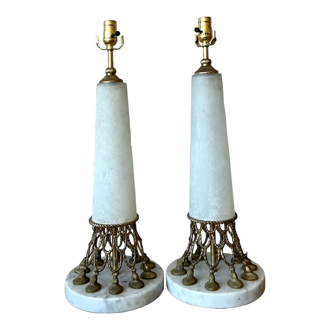 Pair of Hollywood Regency Marble Base Table Lamps with Brass Detail: Pair of Hollywood Regency Marble Base Table Lamps with Brass Detail This pair of vintage Hollywood Regency table lamps showcases a blend of Neoclassical design and mid-century style. Each lamp feature