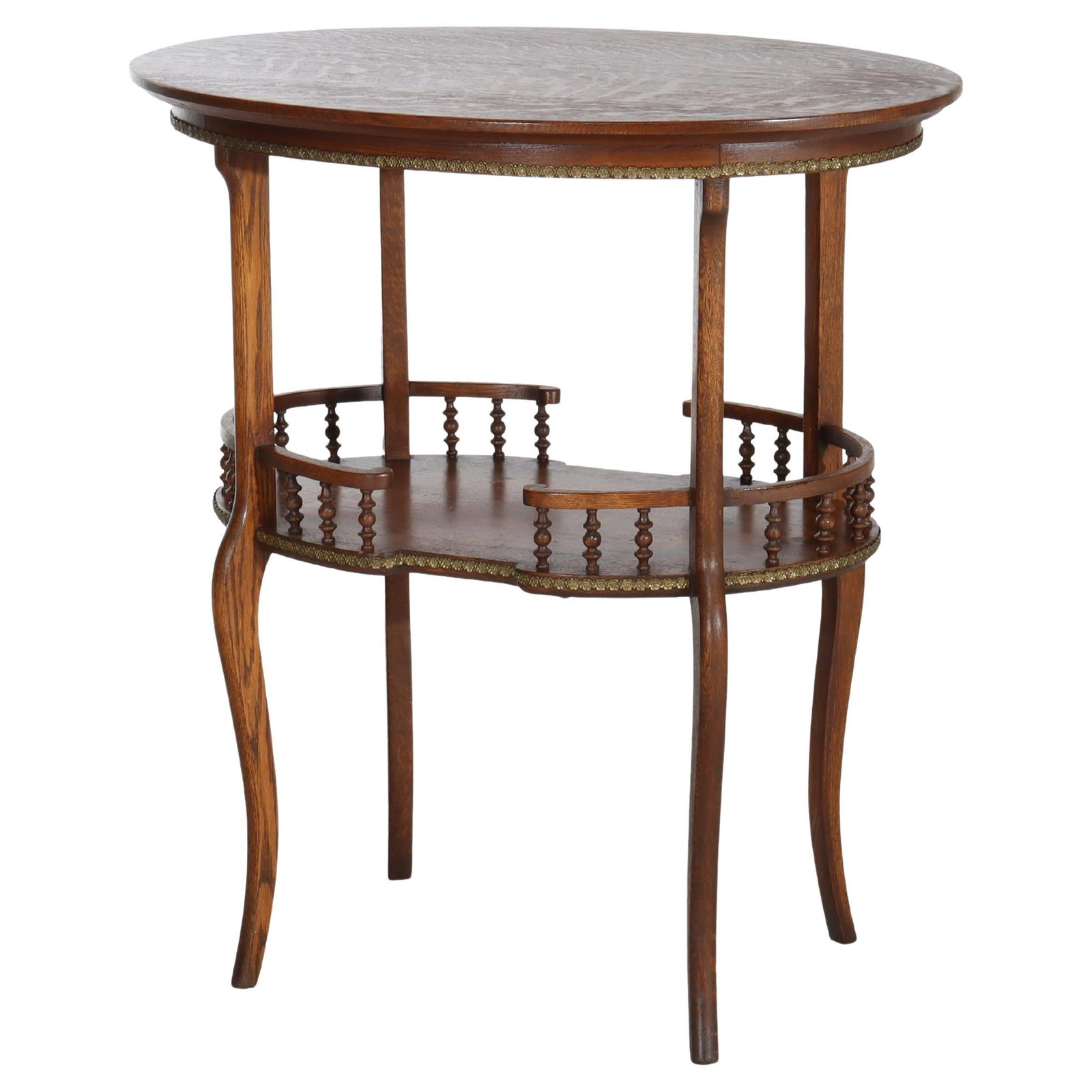 Oval Oak Occasional Table With Ormolu Spindle Rail Circa 1900: Oval Oak Occasional Table With Ormolu Spindle Rail Circa 1900 This antique oval occasional table, attributed to RJ Horner and dating to circa 1900, features quarter sawn oak construction complemented 